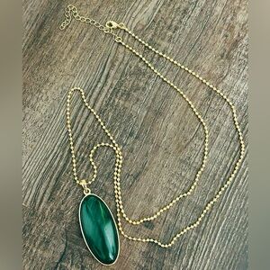 Elegant Gold Necklace with Emerald Stone Pendant